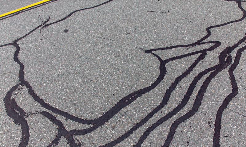 How to Fix Cracks in Asphalt Driveway